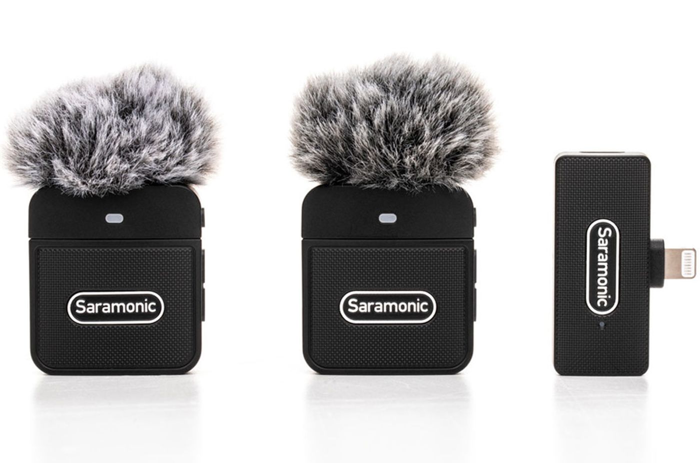 Saramonic Blink 100 B4 transmitters and receiver laid out together