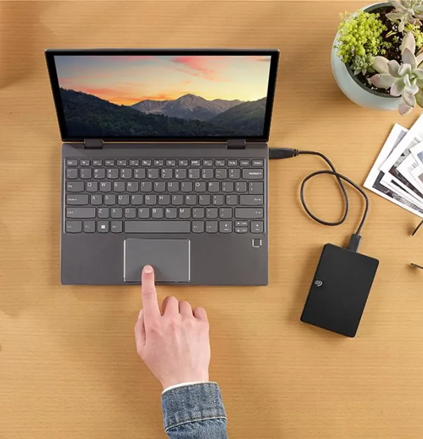 Seagate 4TB external hard drive connected to a laptop for extra storage