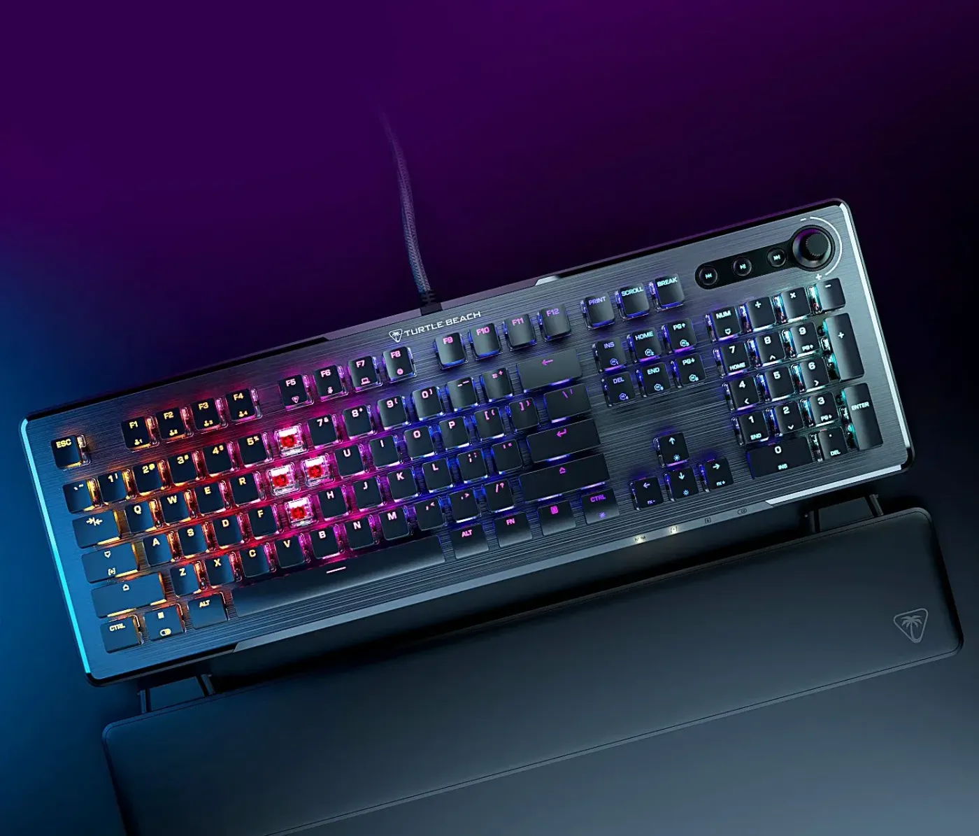 Gaming keyboard features showing palm rest and dedicated media keys