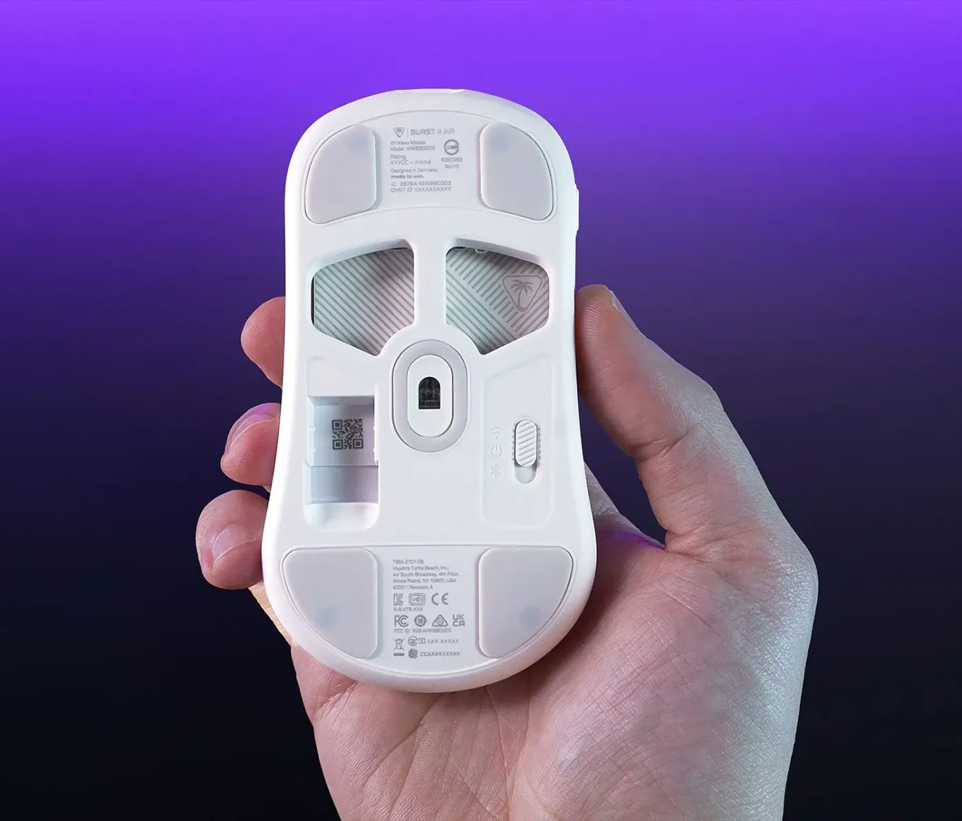 Underside of gaming mouse showing the heat-treated pure PTFE hybrid skate options