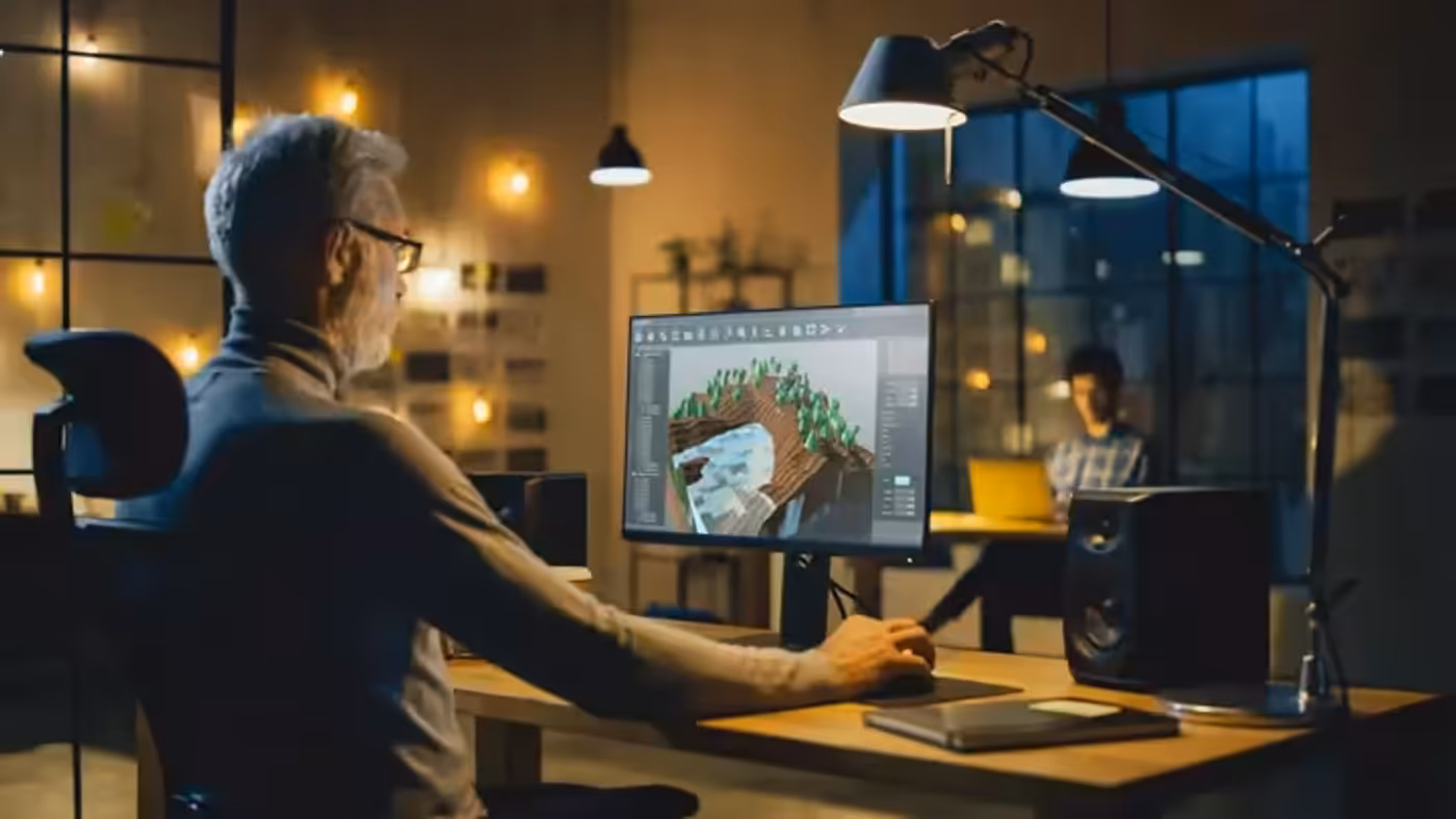 Digital artist using professional workstation tools for animation