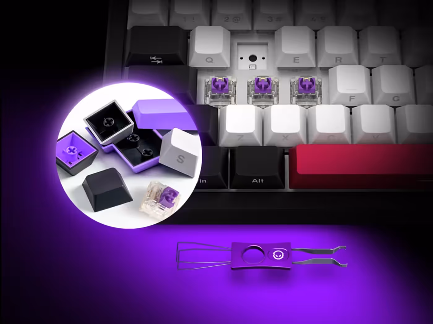 Keyboard showing a switch being removed from its hot-swap socket