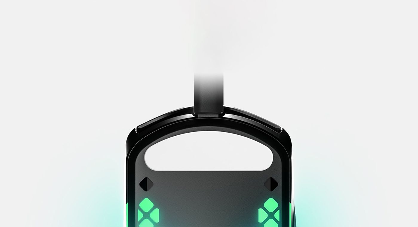 SteelSeries Aerox 3 Gaming Mouse Desktop View showing PTFE glide skates