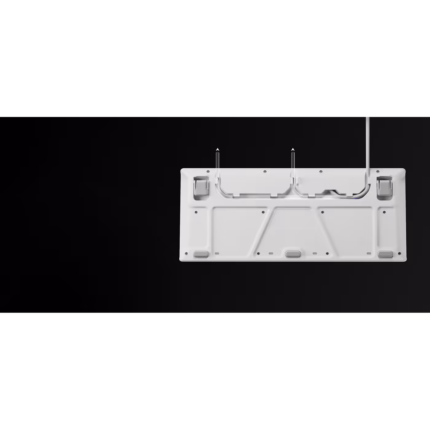White underside of the Apex 3 TKL showing the cable routing channels