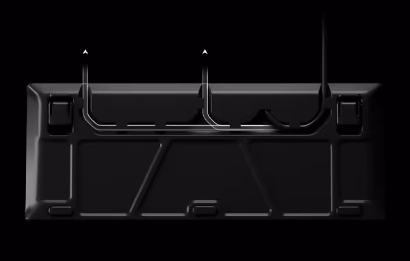 Bottom view showing cable management channels on the Apex 3 TKL