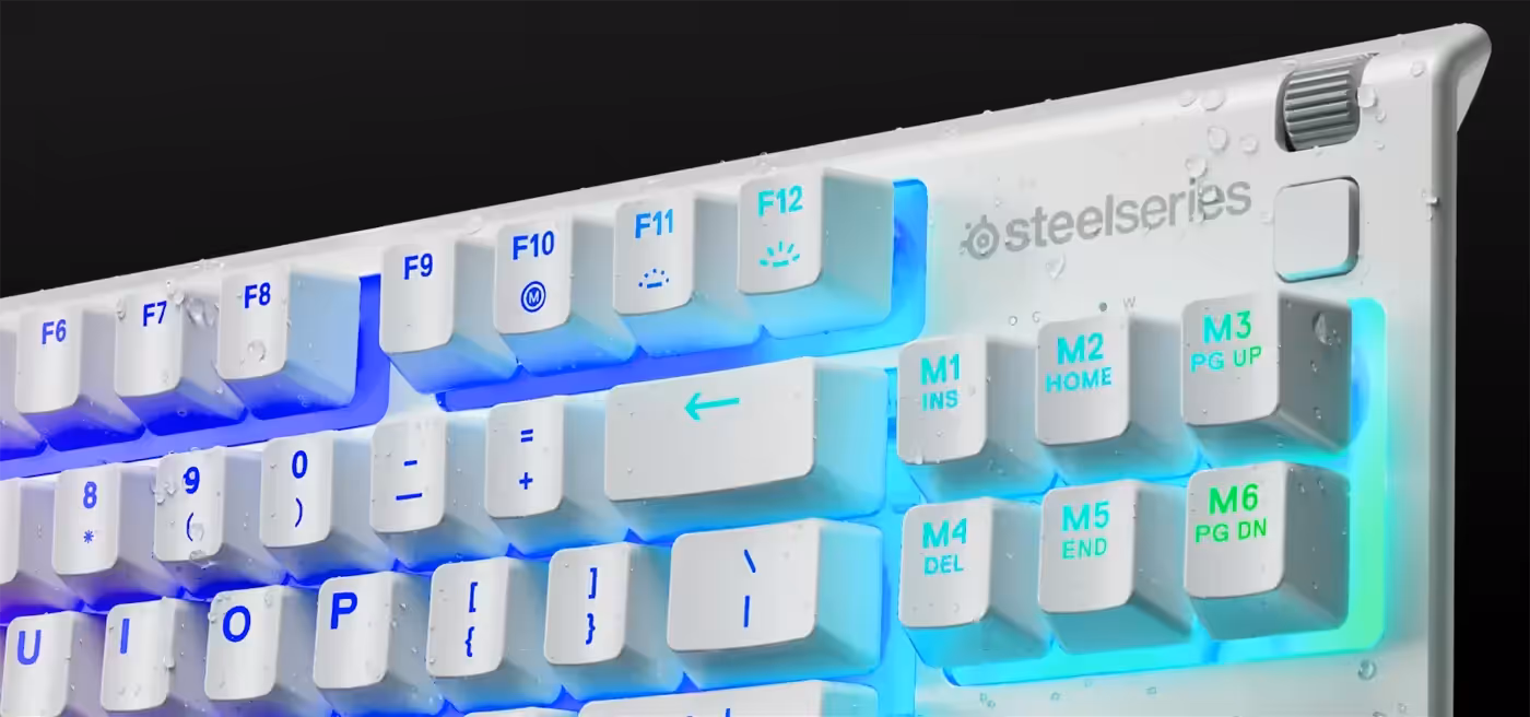 Liquid running off the water-resistant surface of the white Apex 3 TKL keyboard
