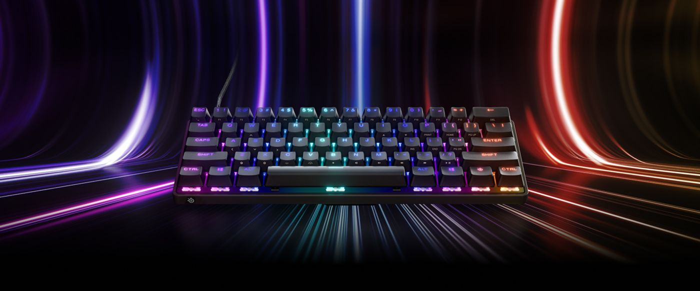 SteelSeries Apex 9 Mini 60% gaming keyboard shown at an angle with its RGB lighting on