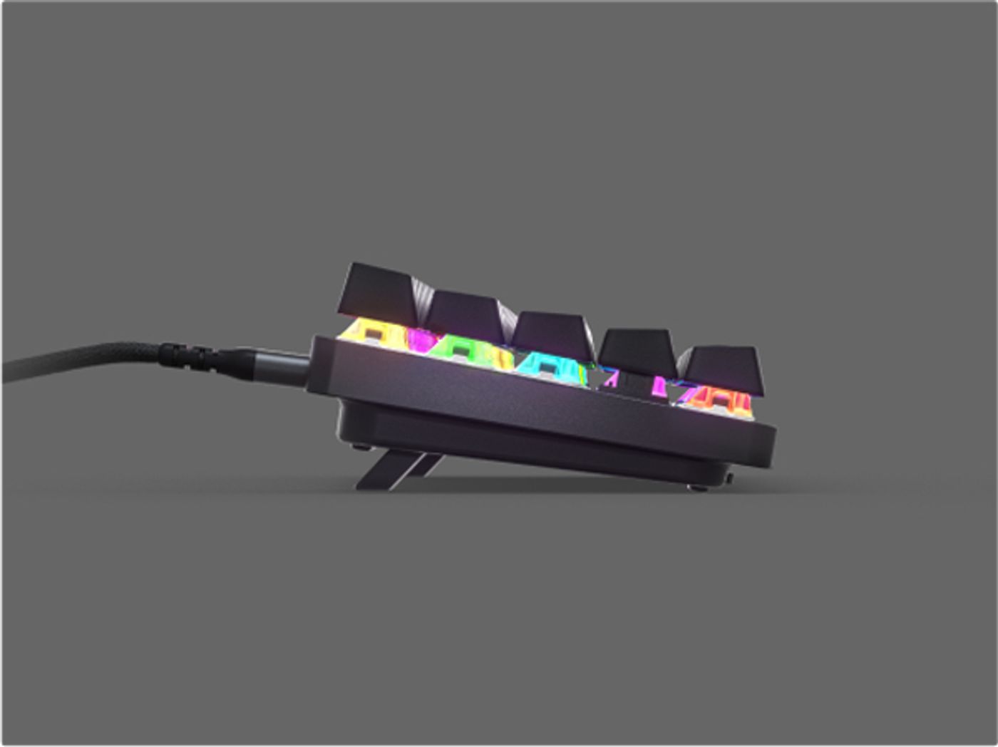Height-adjustable tilt legs on the underside of the Apex 9 Mini, shown at the raised setting