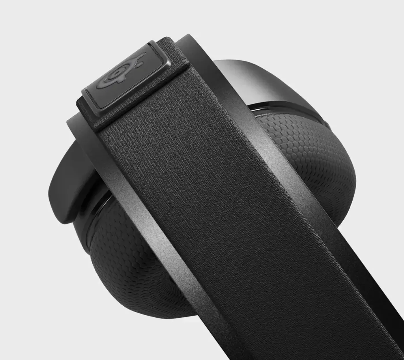 Arctis 7X+ headset showing durable steel headband construction