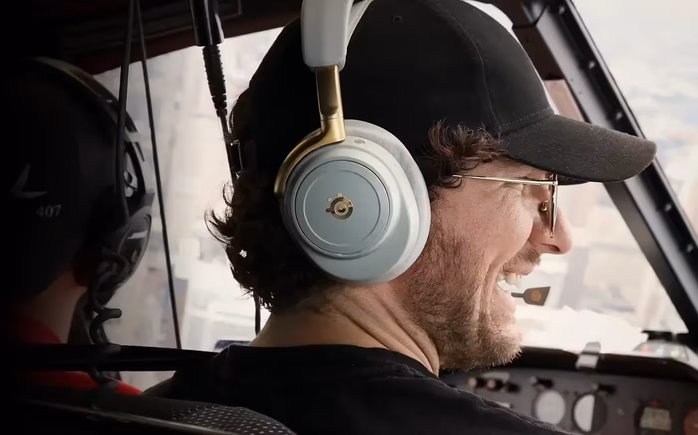 SteelSeries Arctis Nova Elite Wireless AI noise rejection mic in use