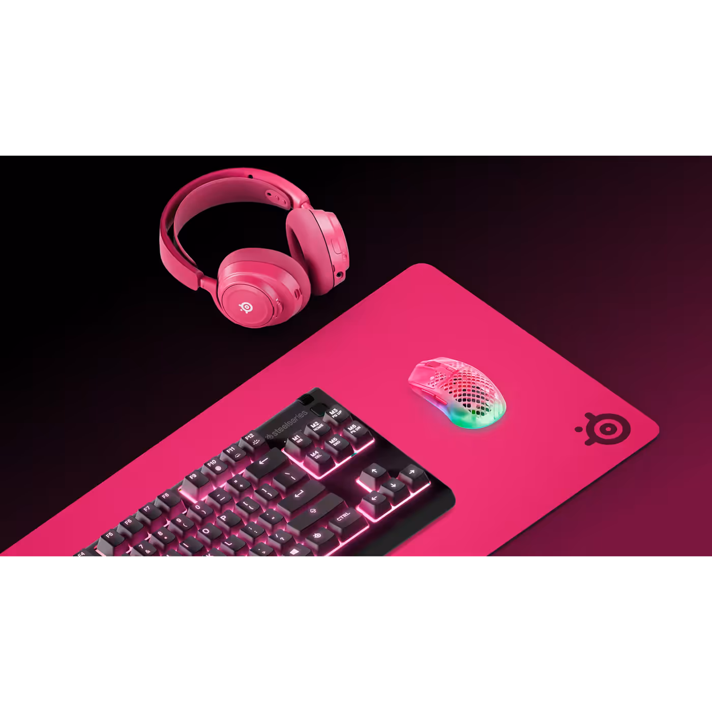 QcK Heavy XXL Magenta in a matching SteelSeries desk setup