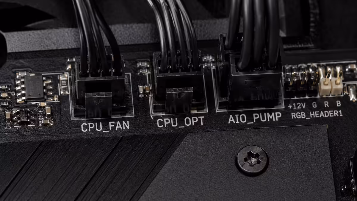 Motherboard header cluster with pump and fan cables