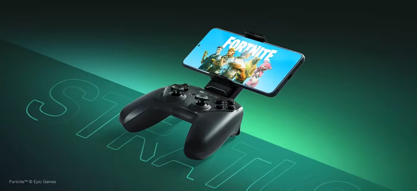 Stratus Plus gamepad with an attached phone displaying the game Fortnite.