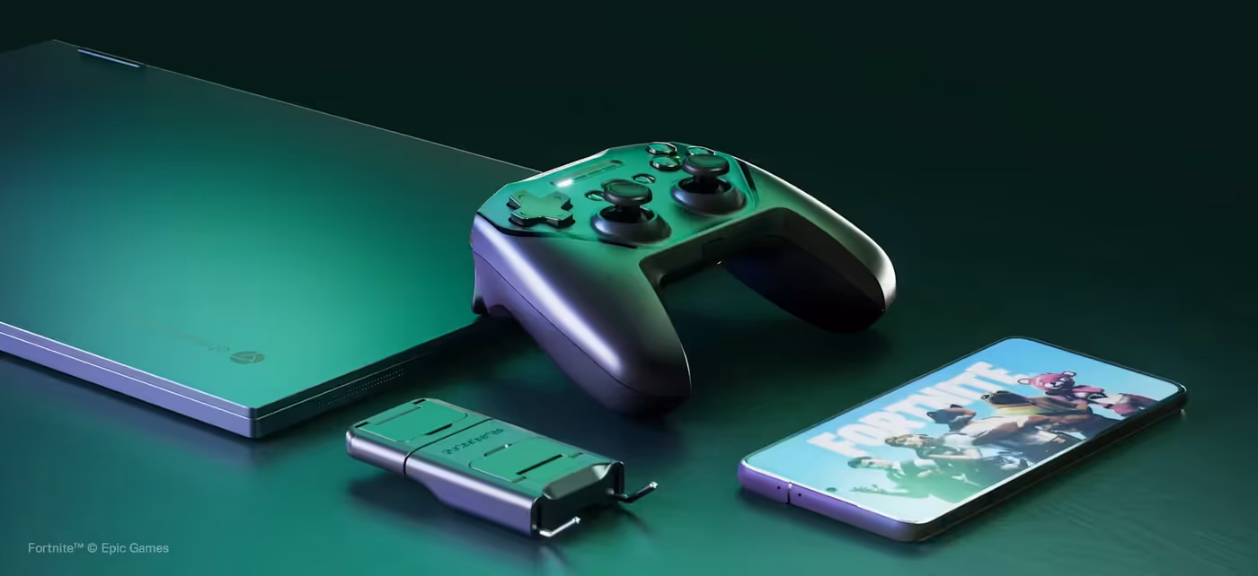 The Stratus Plus next to which there is a phone, a laptop, and a phone charger extension cord.
