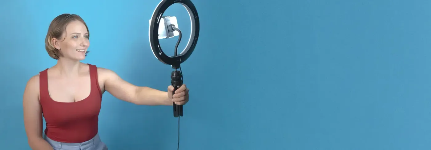 Black LED ring light with adjustable brightness suitable for professional photography and streaming setup