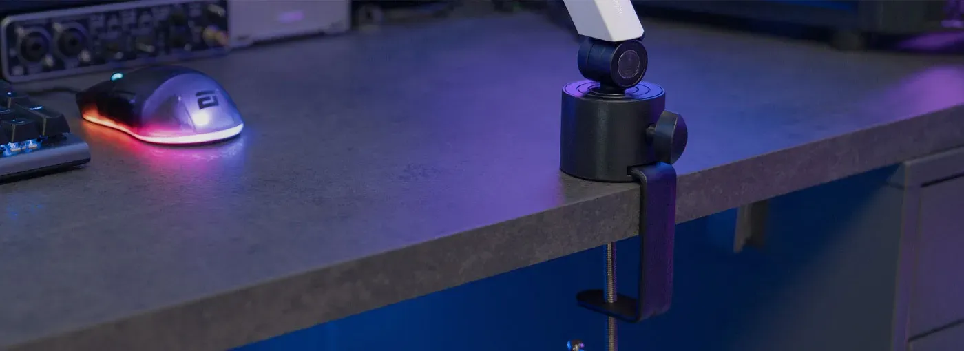 Streamplify Mount Arm attached securely to a desk surface