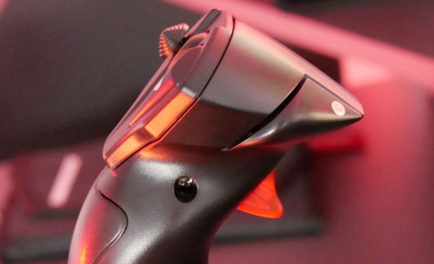 Thrustmaster T Flight Stick X displaying the versatile brake and fire trigger