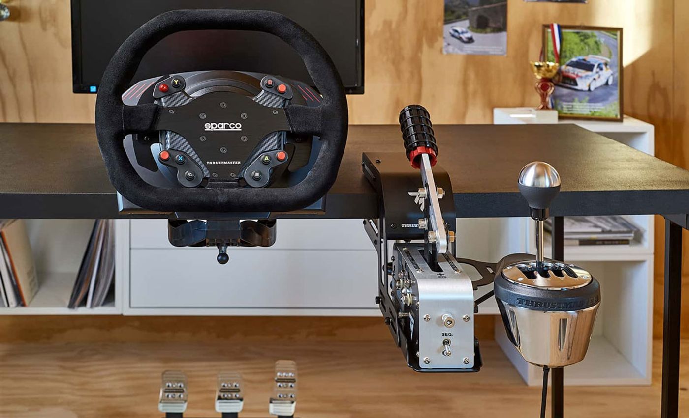 TM Racing Clamp adjusted to a different height and angle on a desk