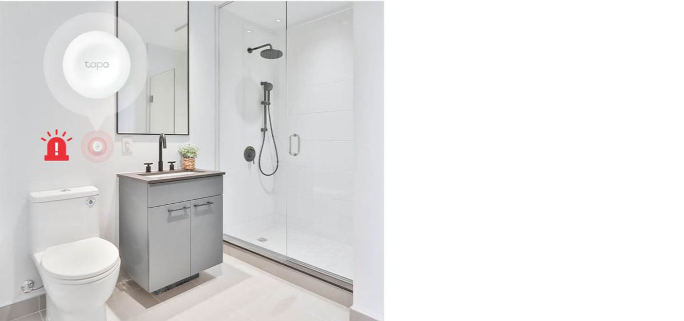 Tapo S200B smart button placed beside a bed for emergency access