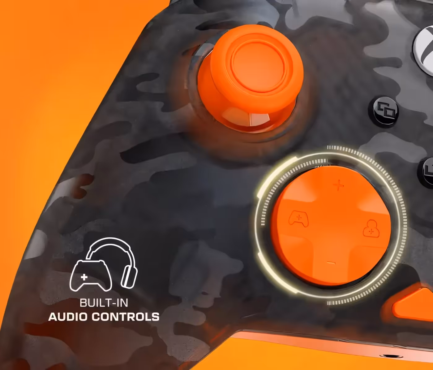 Gaming controller close-up with camouflage design and orange accents