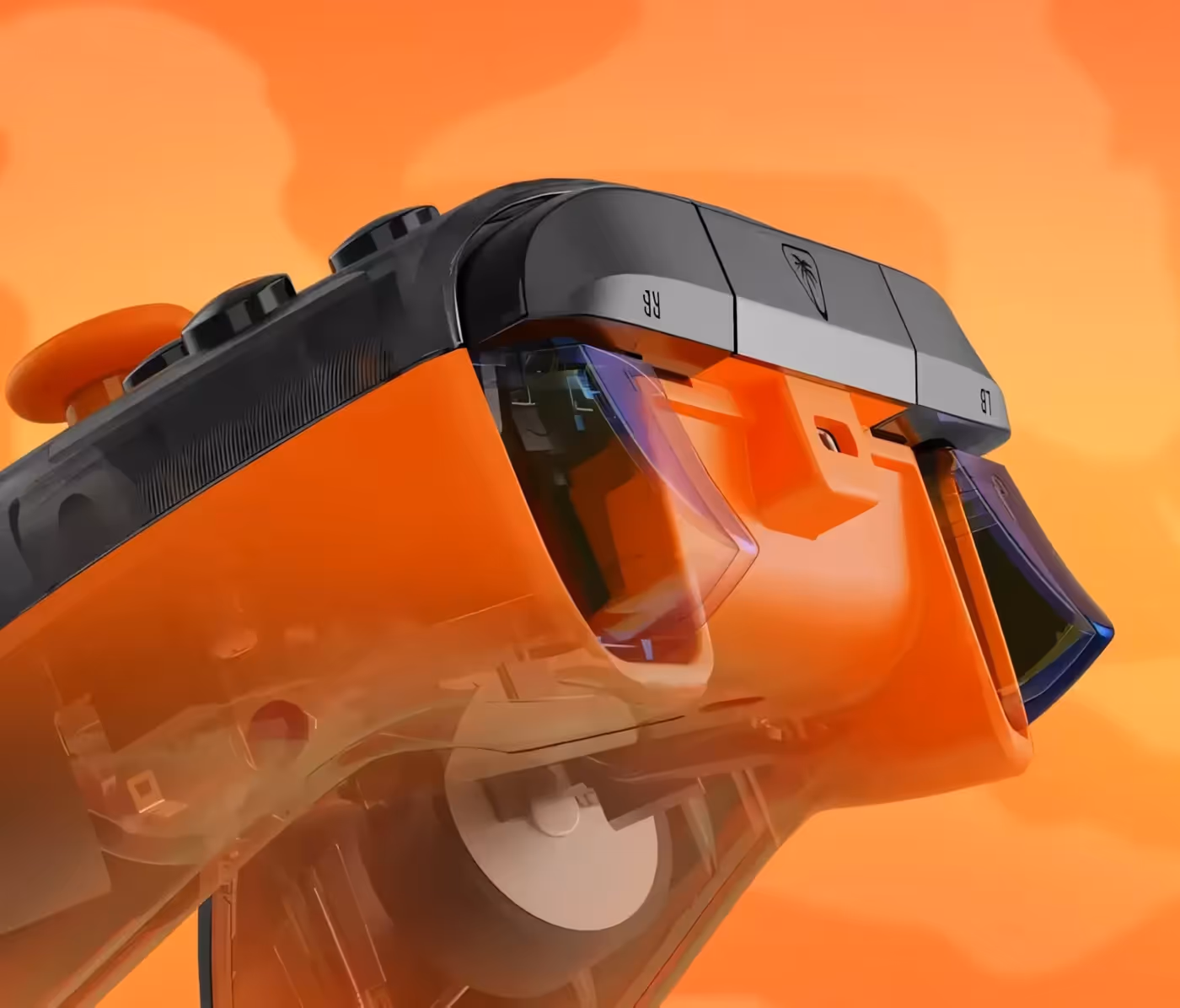 Transparent orange gaming controller against orange background