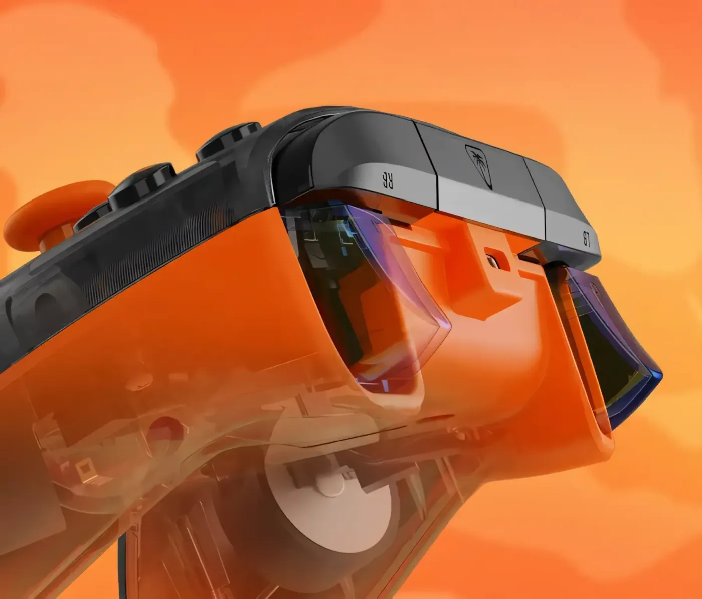 Transparent orange gaming controller against orange background