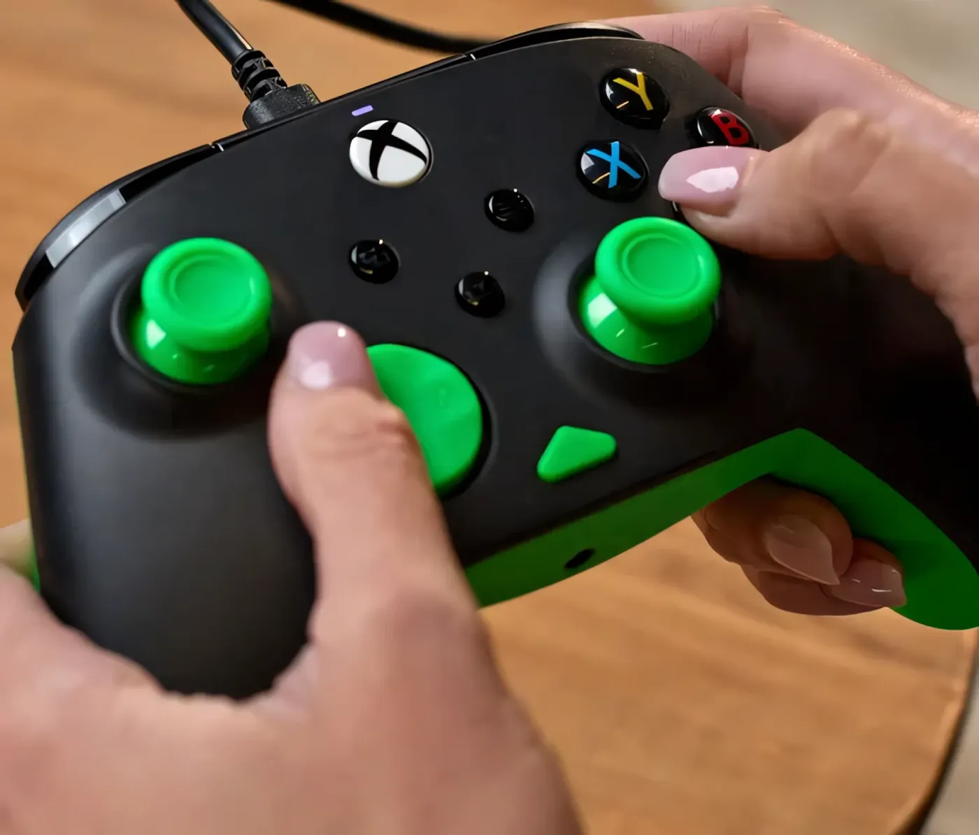 Ergonomic gaming controller featuring textured grips for comfortable extended gameplay