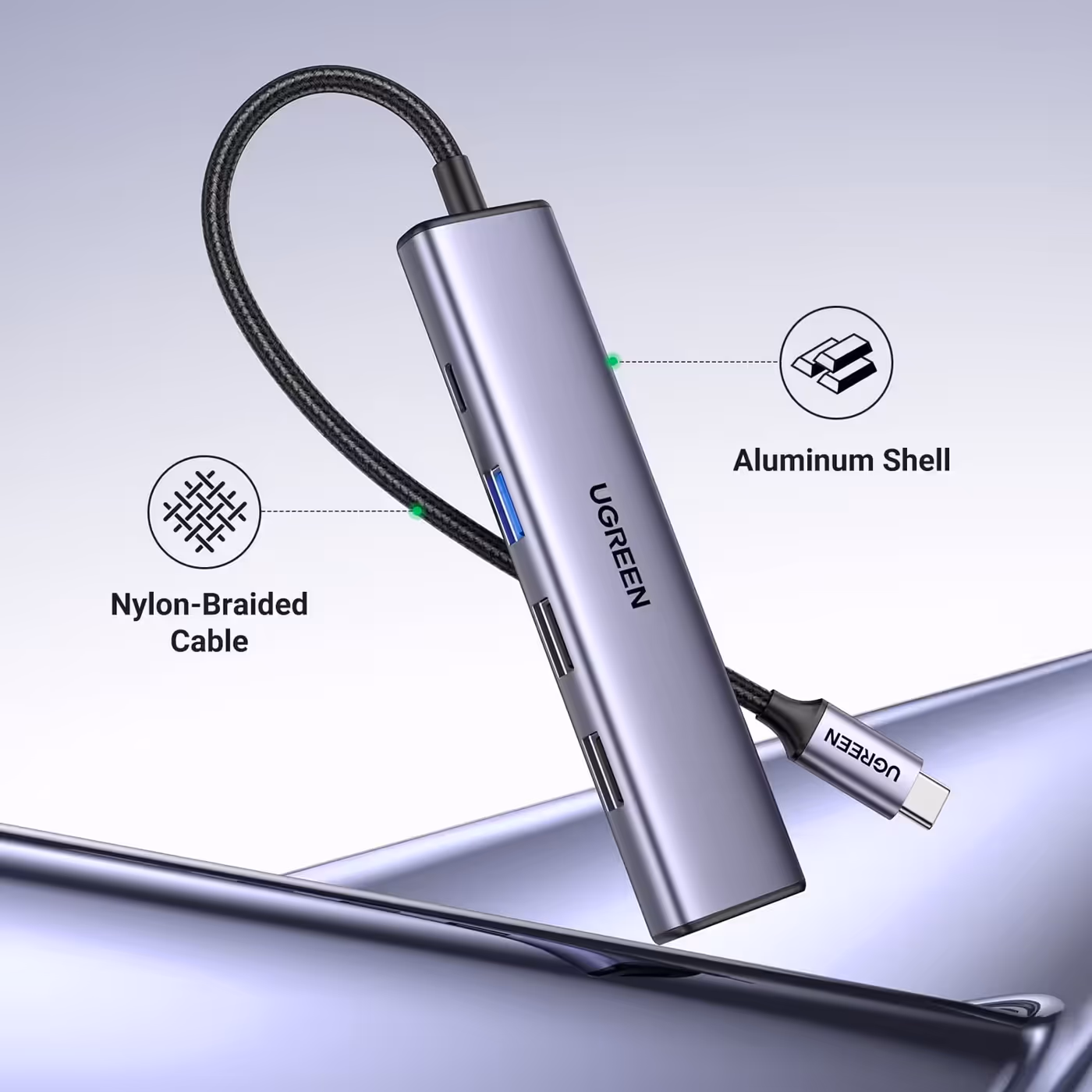 Close-up of the UGREEN Revodok 105 aluminium shell and braided cable