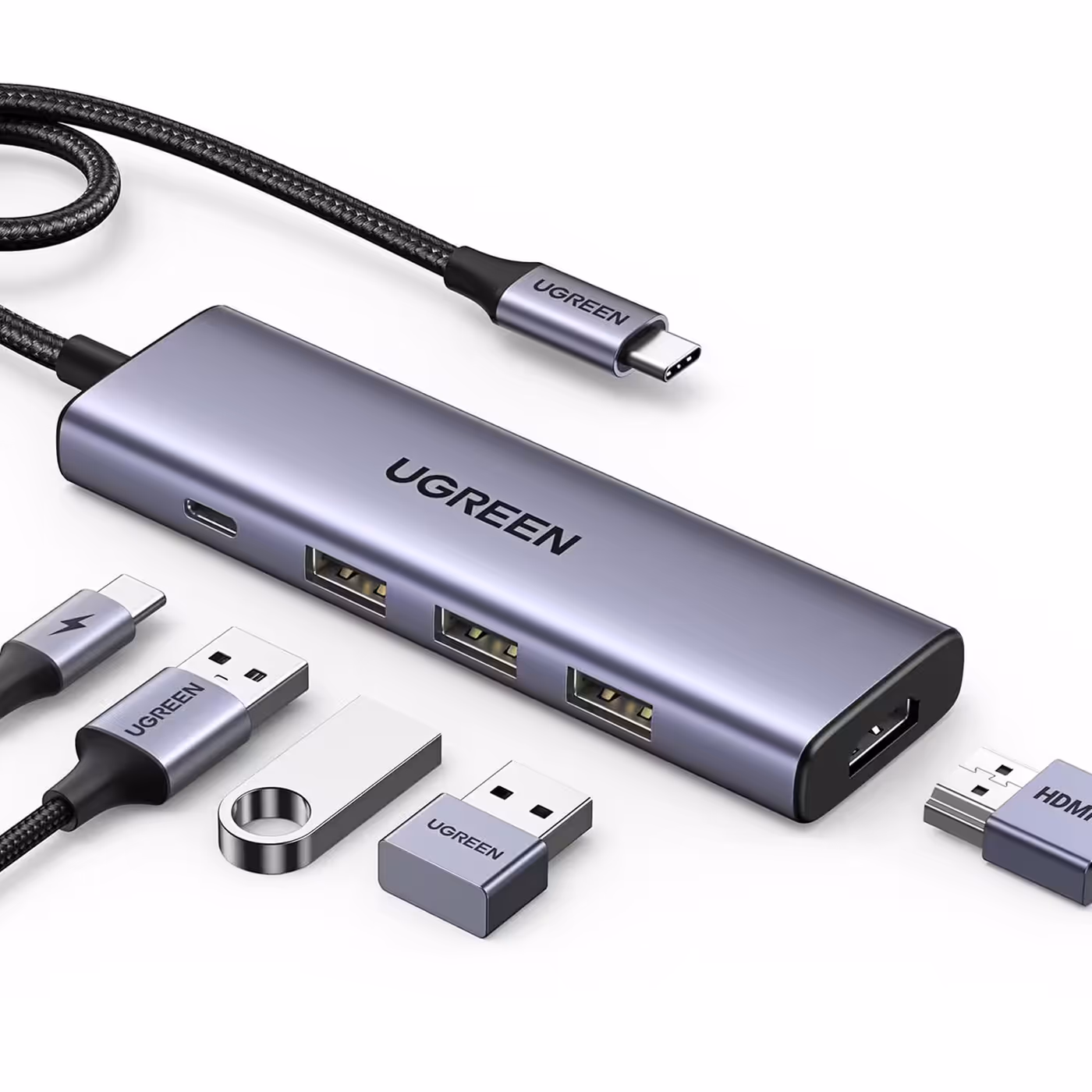 UGREEN Revodok 5-in-1 USB-C hub with flash drives and an HDMI cable beside it