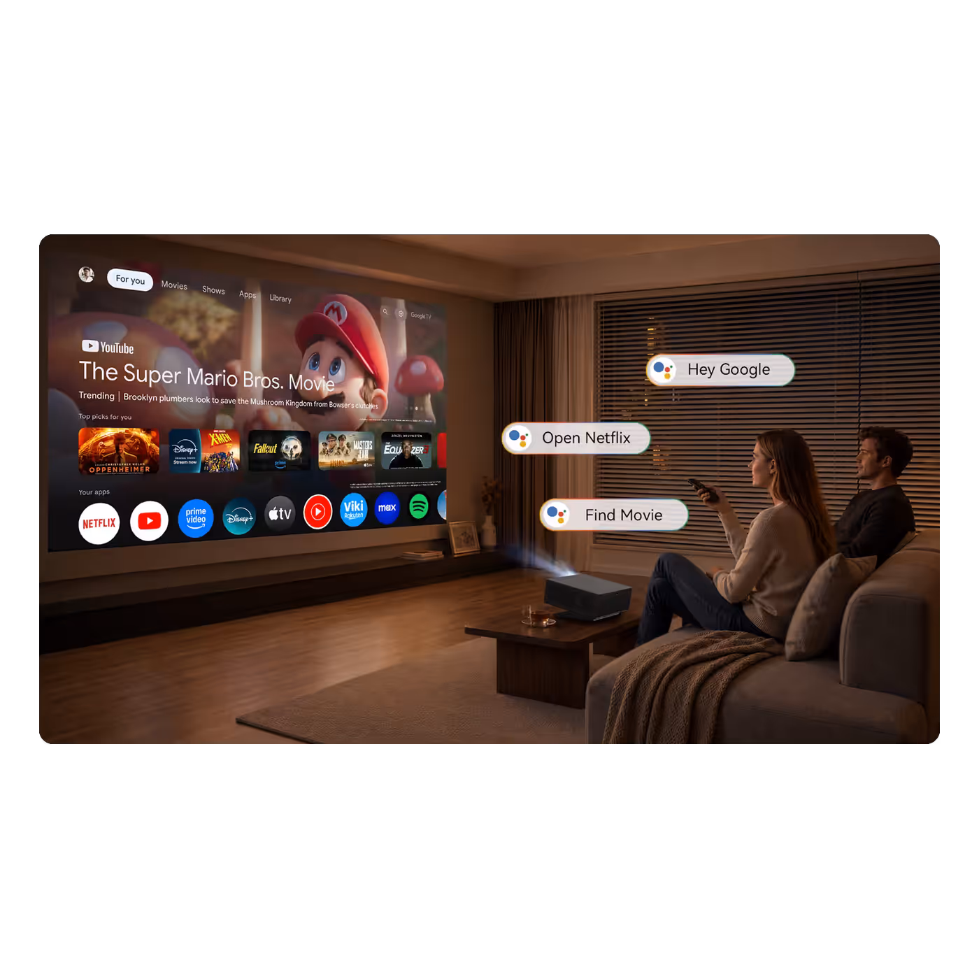 Couple using Google Assistant voice search on the Wanbo X7 Pro Max in a living room