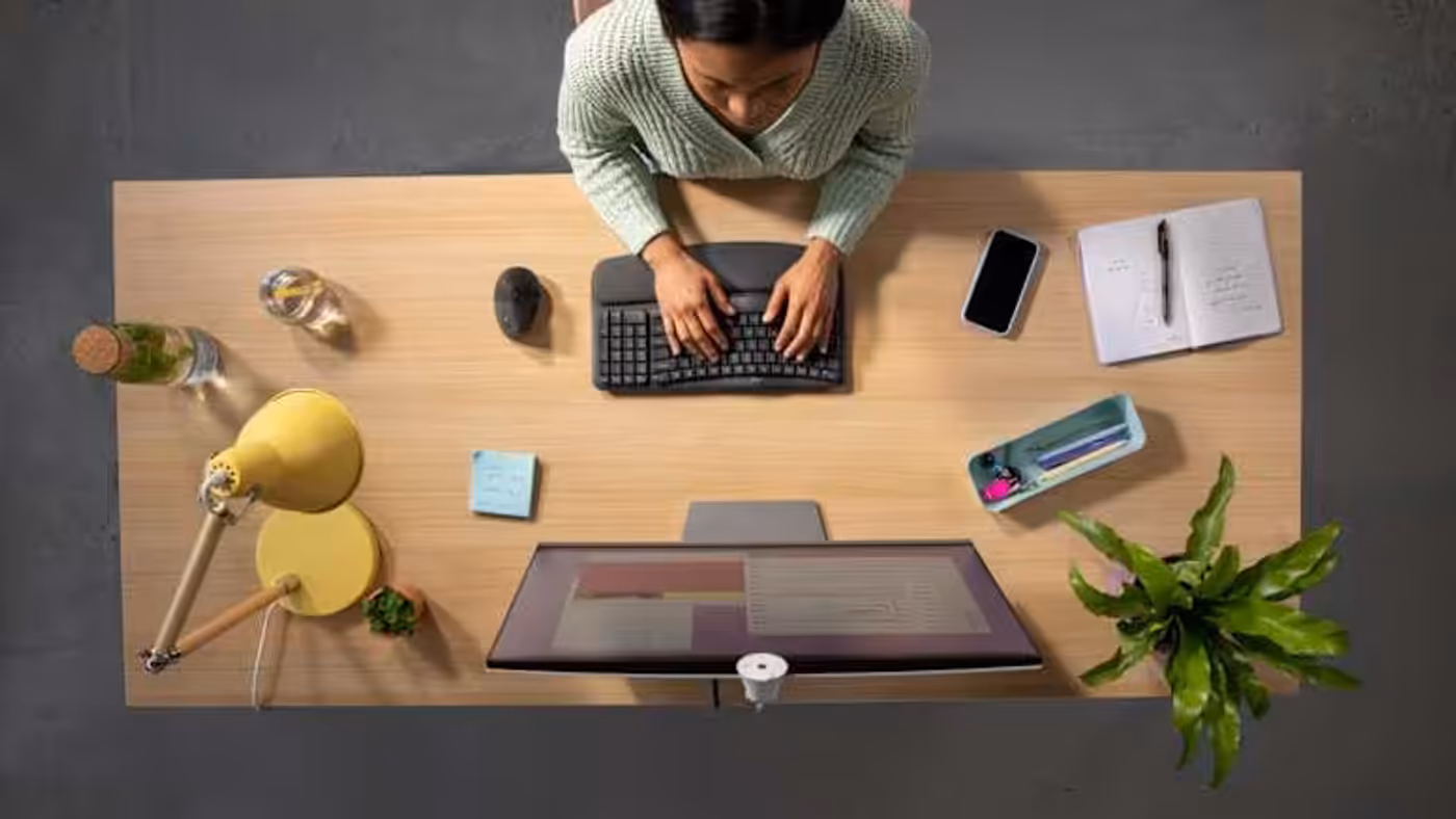 Compact Wave Keys and Lift mouse setup designed for natural shoulder positioning