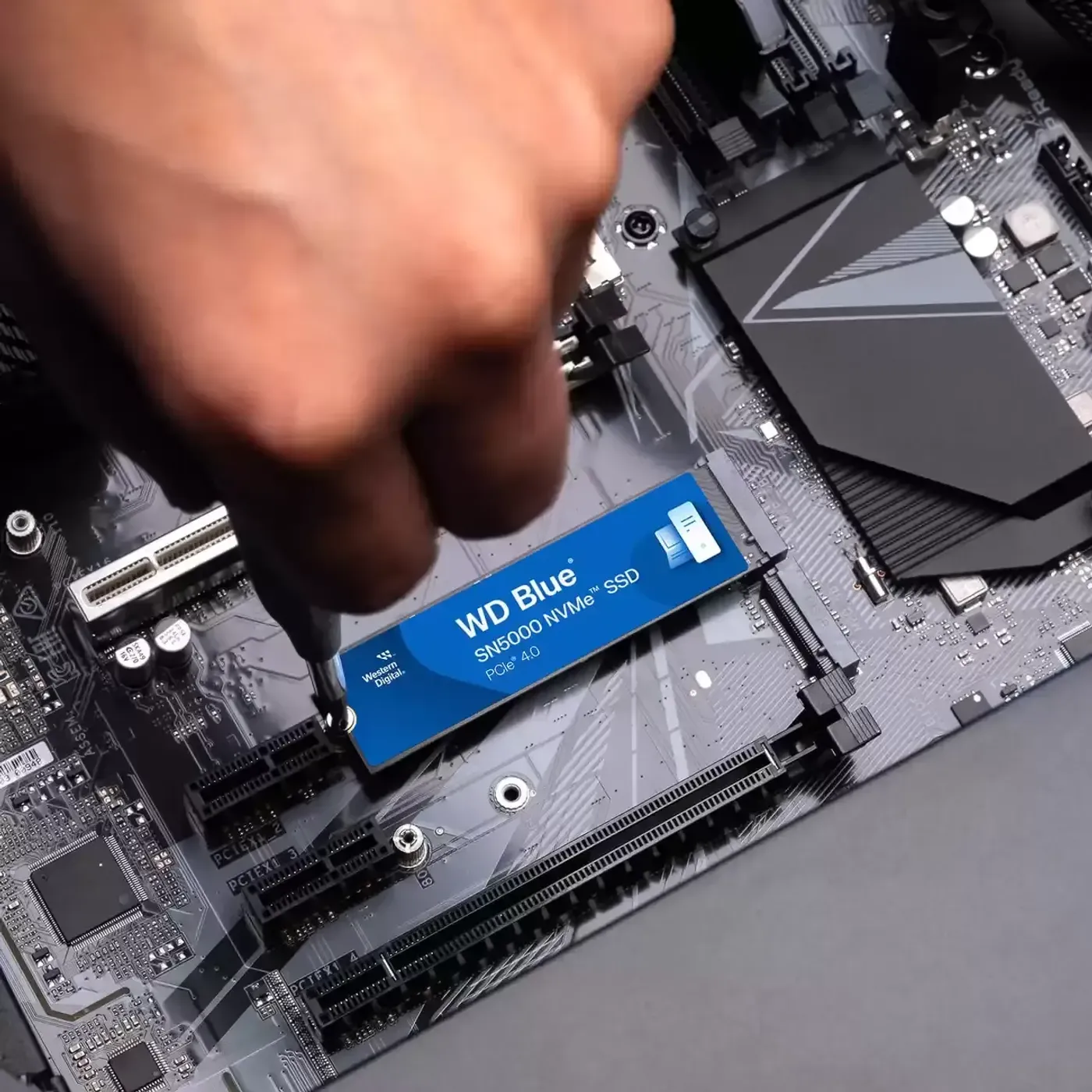 WD Blue SN5000 4TB NVMe SSD supporting multiple applications on a PC