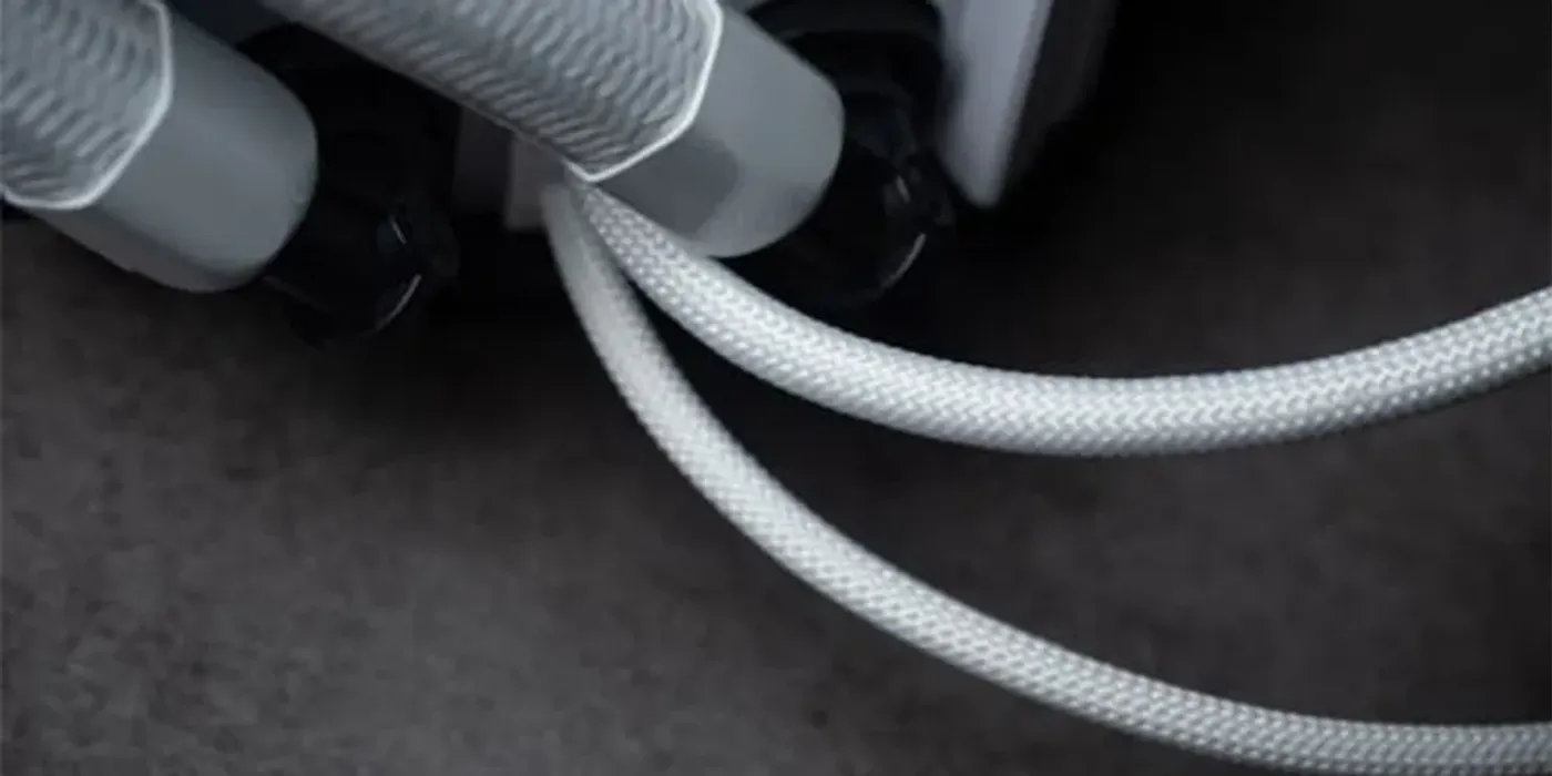 Braided LCD and pump header cable for improved cable management
