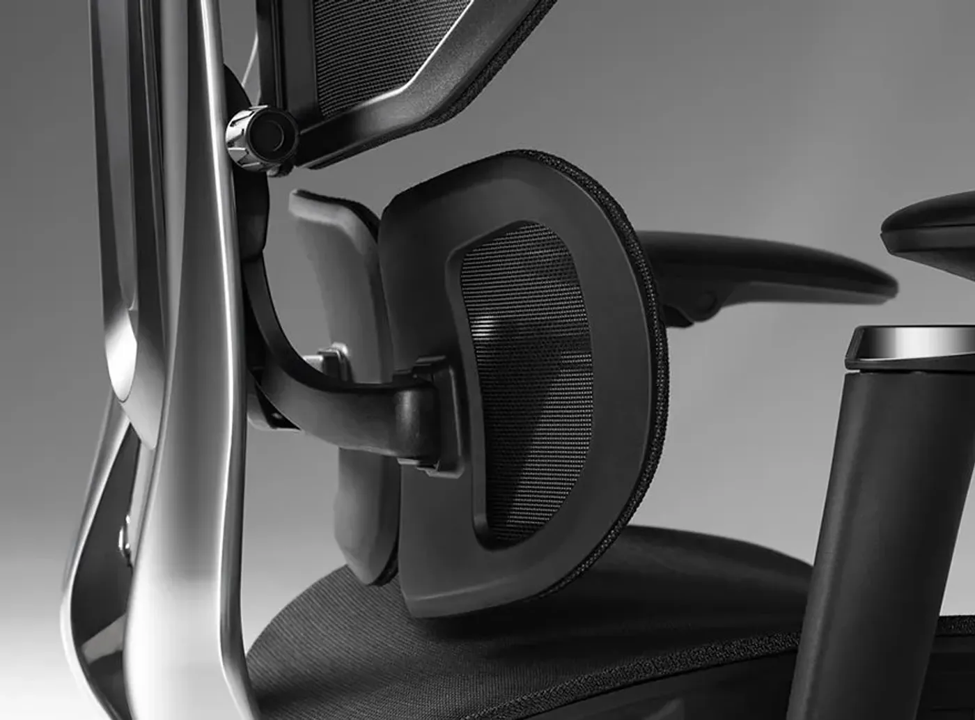 Close-up view of the dual-zone floating lumbar support feature on the X2 Pro chair