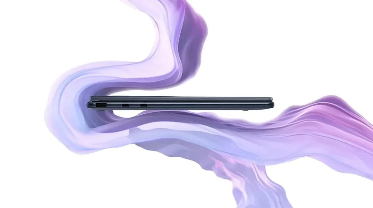 A lavender ribbon swirls about a closed Yoga 9i 2-in-1 Gen 10 Aura Edition (14 Intel).
