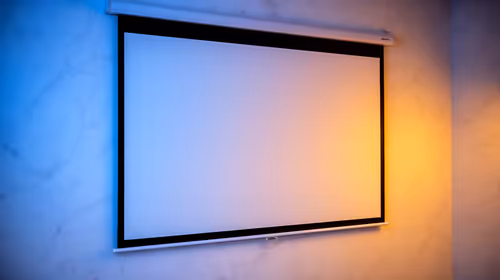 Projector Screen vs White Wall: Maximize Image Quality