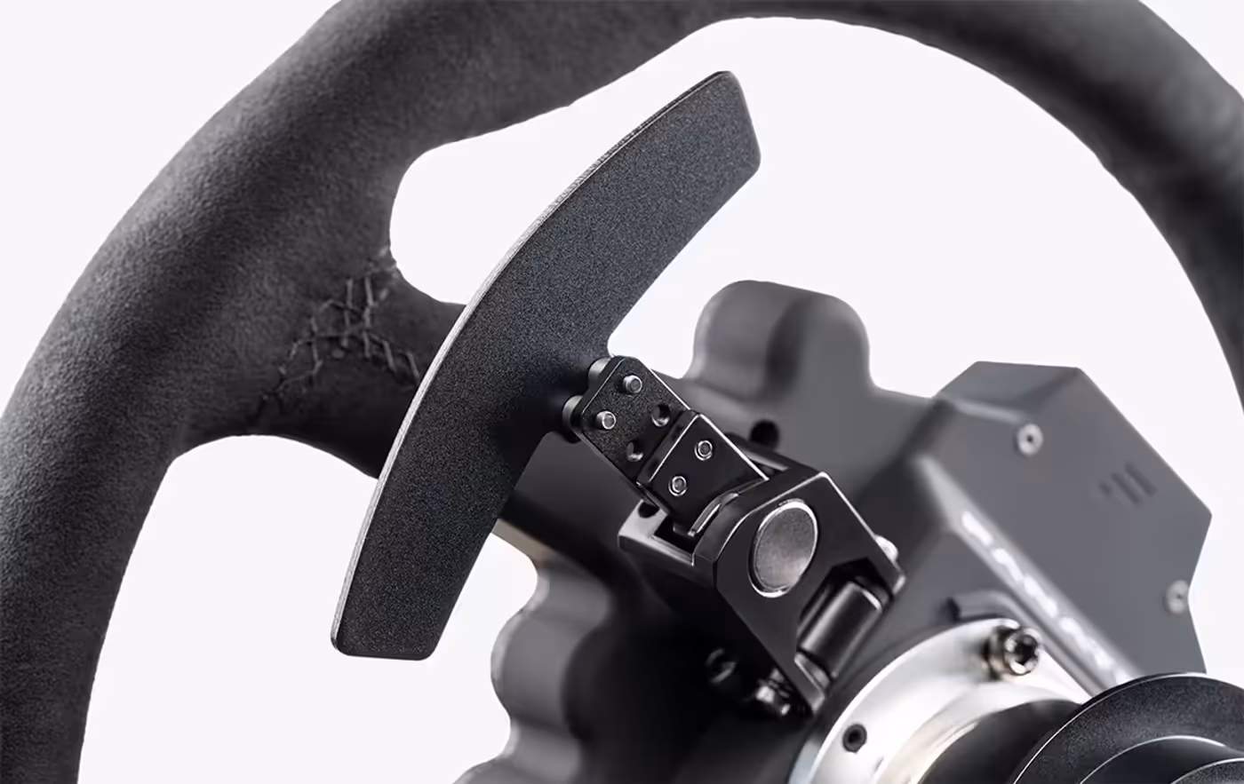 Magnetic shifter paddles behind the rim