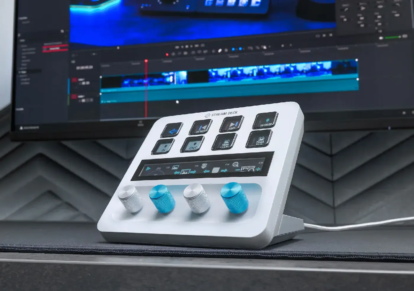 Close-up of the blue Corsair Elgato Stream Deck Dials Set installed on a desk