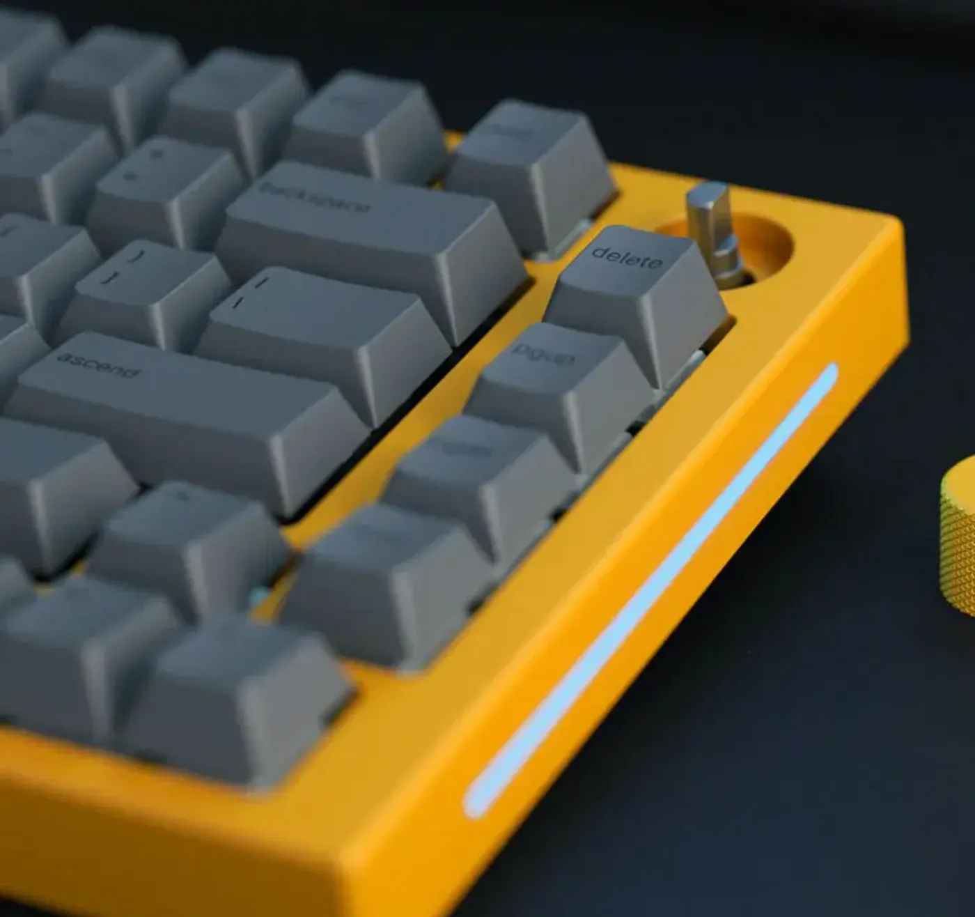 Detail of the textured gold rotary knob for the GMMK Pro