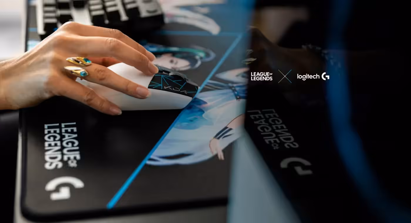 Logitech G305 wireless gaming mouse shown from the side on a desk surface