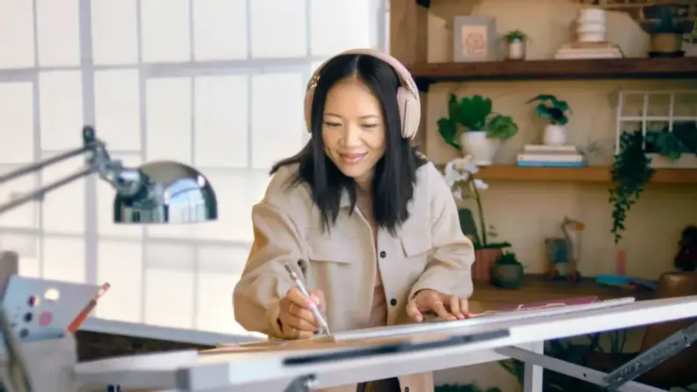 Logitech Zone Vibe 100 wireless headphones in white showing stylish design