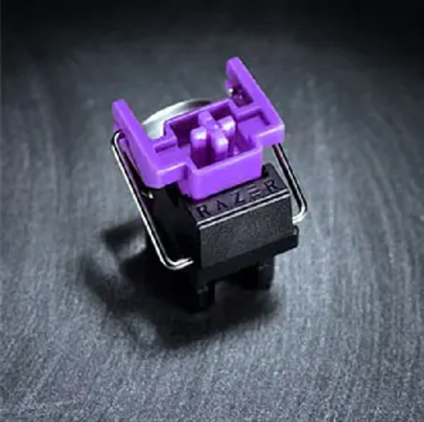 Cutaway of a Razer Clicky Optical purple switch