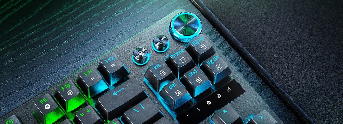 Tenkeyless keyboard with brushed aluminum top plate and compact layout